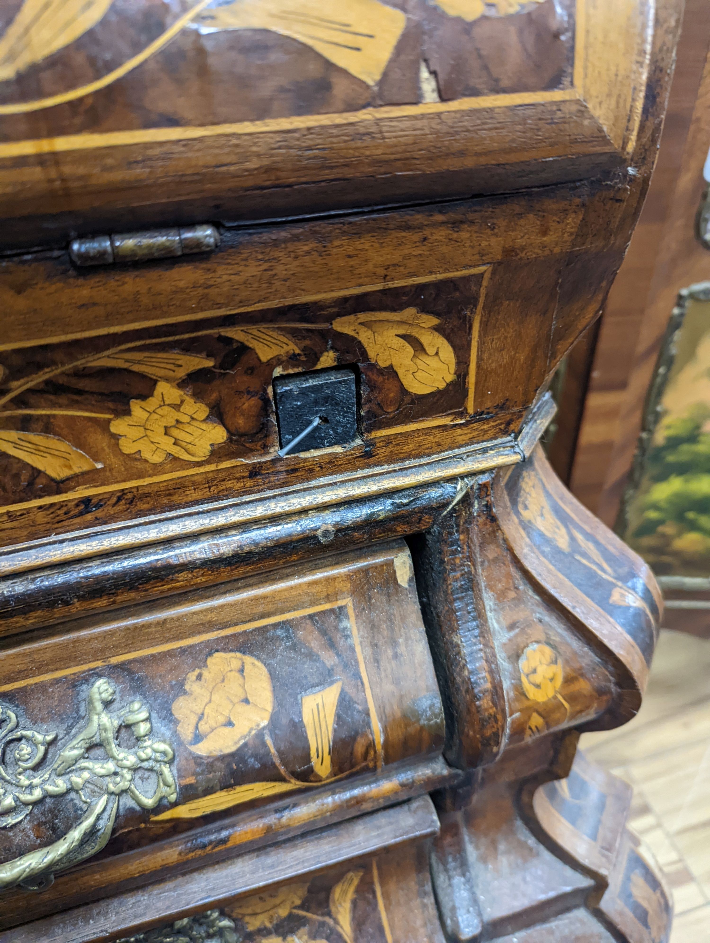 A Dutch floral marquetry walnut bombe bureau cabinet, width 120cm, depth 60cm, height 210cm